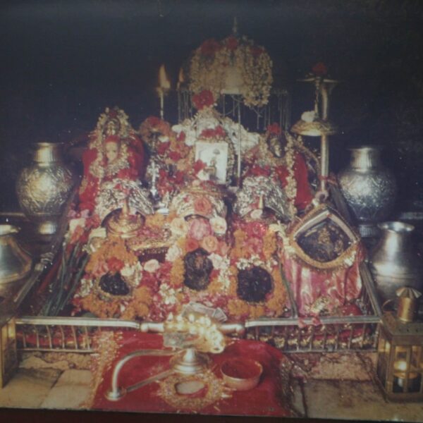 A close-up of the Garbh Grih, the inner sanctum of the Mata Vaishno Devi Bhawan, where the idols of the goddess Vaishno Devi and her three forms are enshrined.